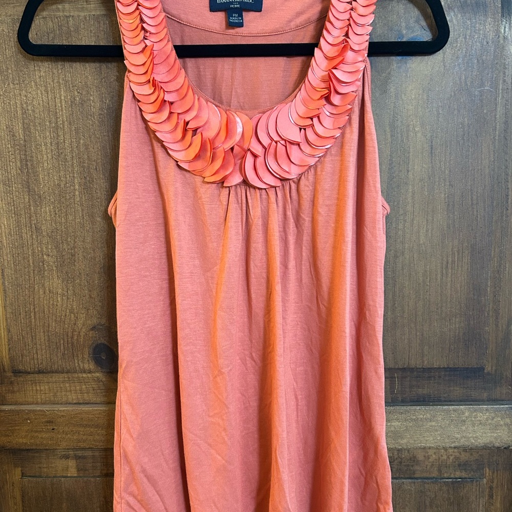 Orange Sleeveless Top with Decorative Neckline